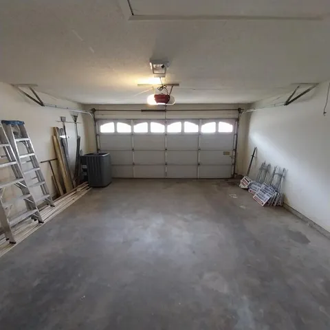 a view of a garage with furniture