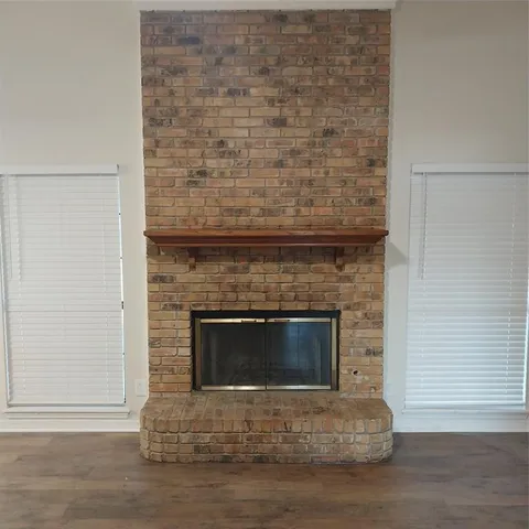 a living room with a fireplace