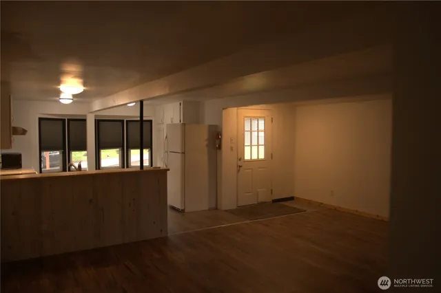 a view of kitchen with wooden floor