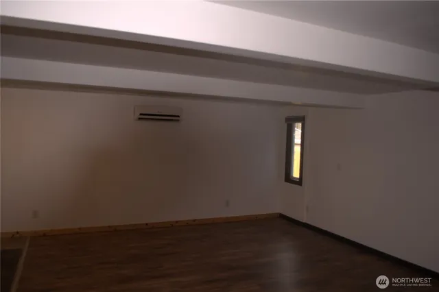 a view of a room with an empty space
