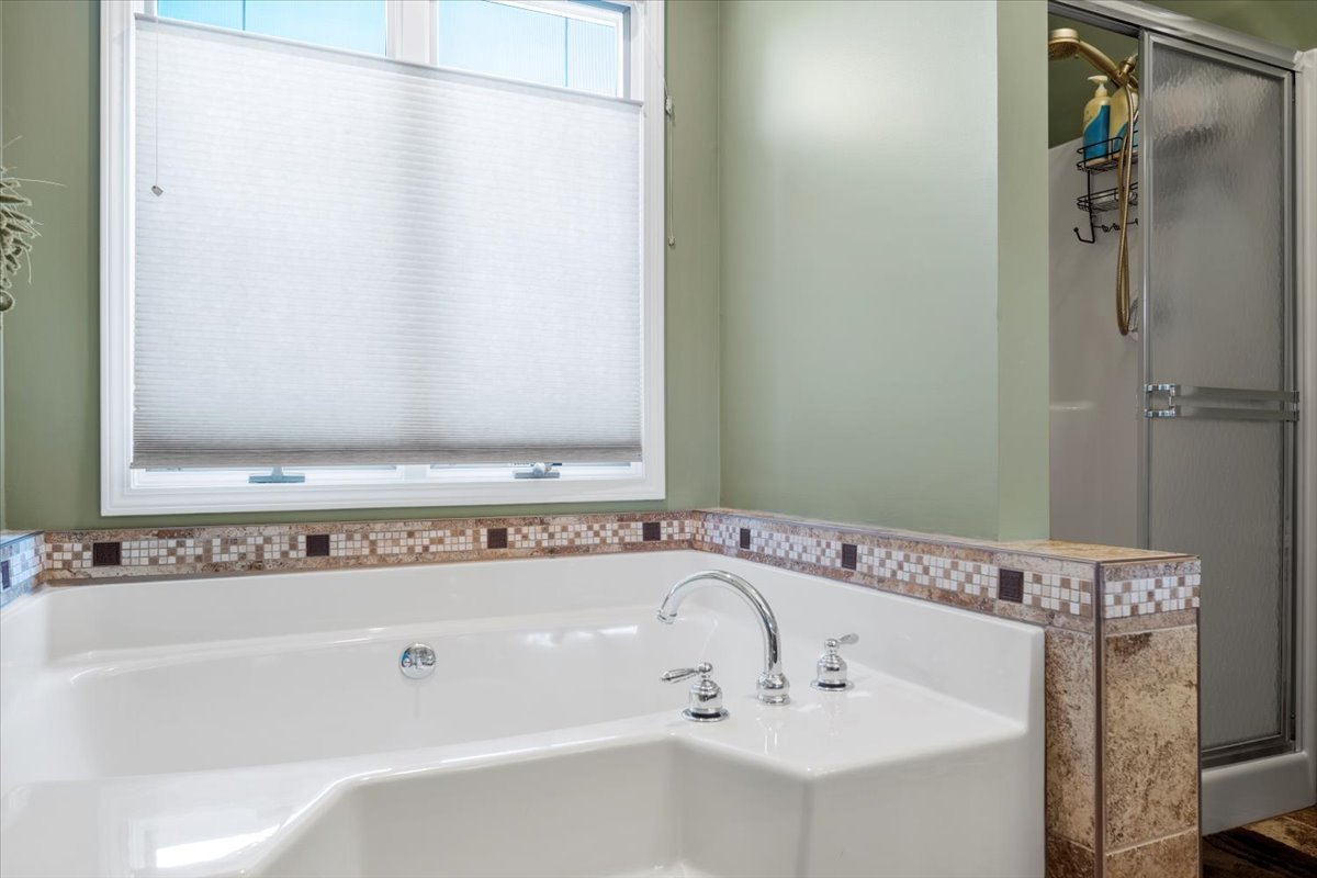 3215 Eagle Crest Road Bloomington, IL 61704 - Photo 25 of 35 a bathroom with a sink and a mirror
