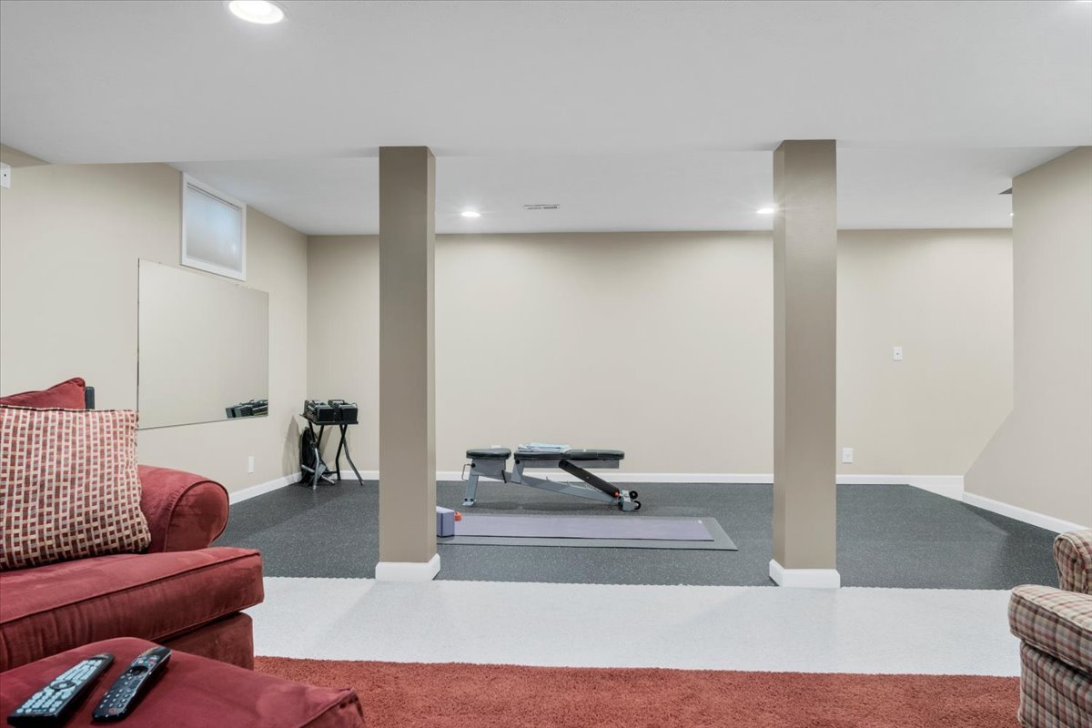 3215 Eagle Crest Road Bloomington, IL 61704 - Photo 31 of 35 a living room with furniture and view of wooden floor