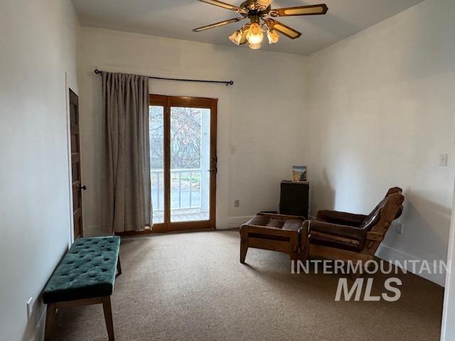 450 South 3rd E Street Mountain Home, ID 83647 - Photo 15 of 35 Sitting room with carpet flooring and ceiling fan
