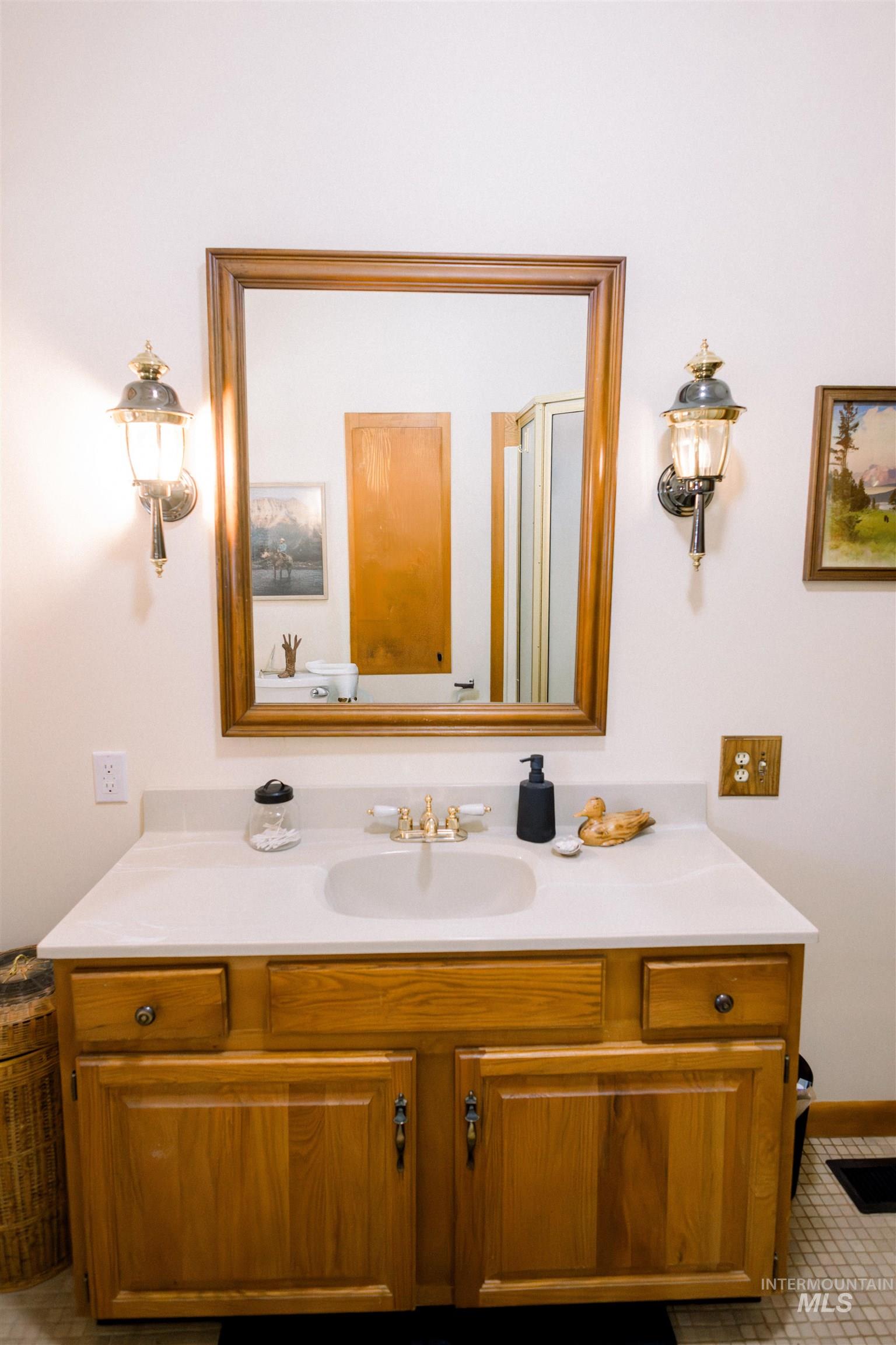 450 South 3rd E Street Mountain Home, ID 83647 - Photo 23 of 35 Bathroom with vanity and tile patterned floors
