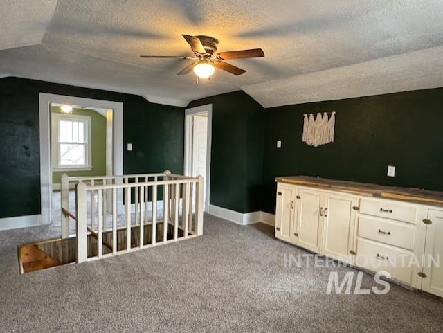 450 South 3rd E Street Mountain Home, ID 83647 - Photo 25 of 35 Additional living space with a ceiling fan and light carpet