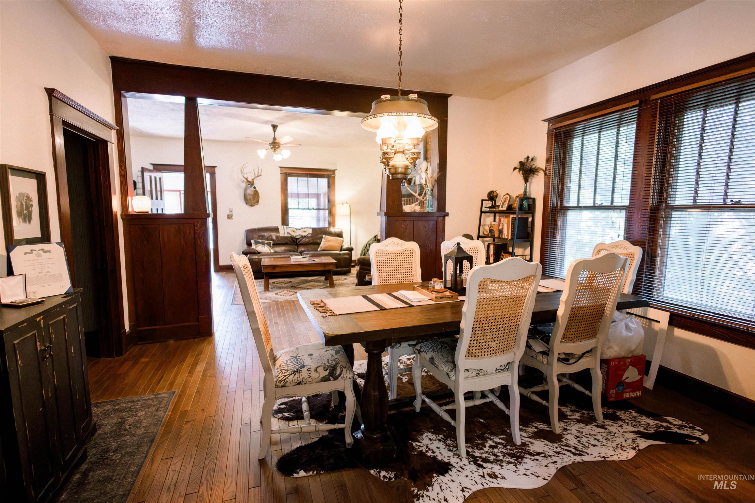 450 South 3rd E Street Mountain Home, ID 83647 - Photo 10 of 35 Dining space featuring hardwood / wood-style flooring and ceiling fan