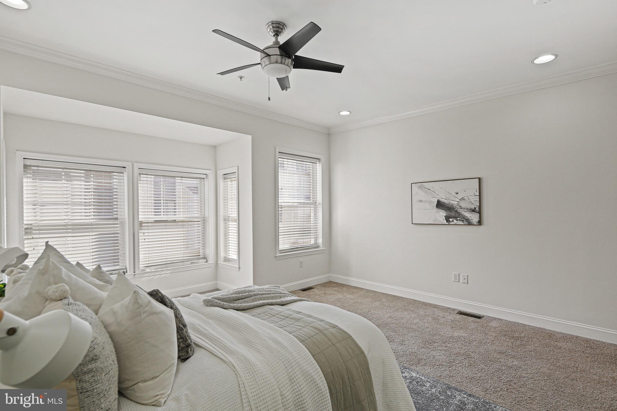 3418 Gunther Way Baltimore, MD 21224 - Photo 24 of 57 a bed room with a bed and a window
