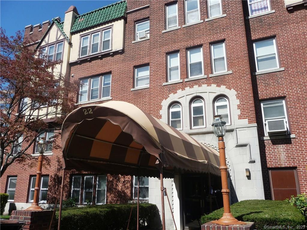 a front view of a building with balcony
