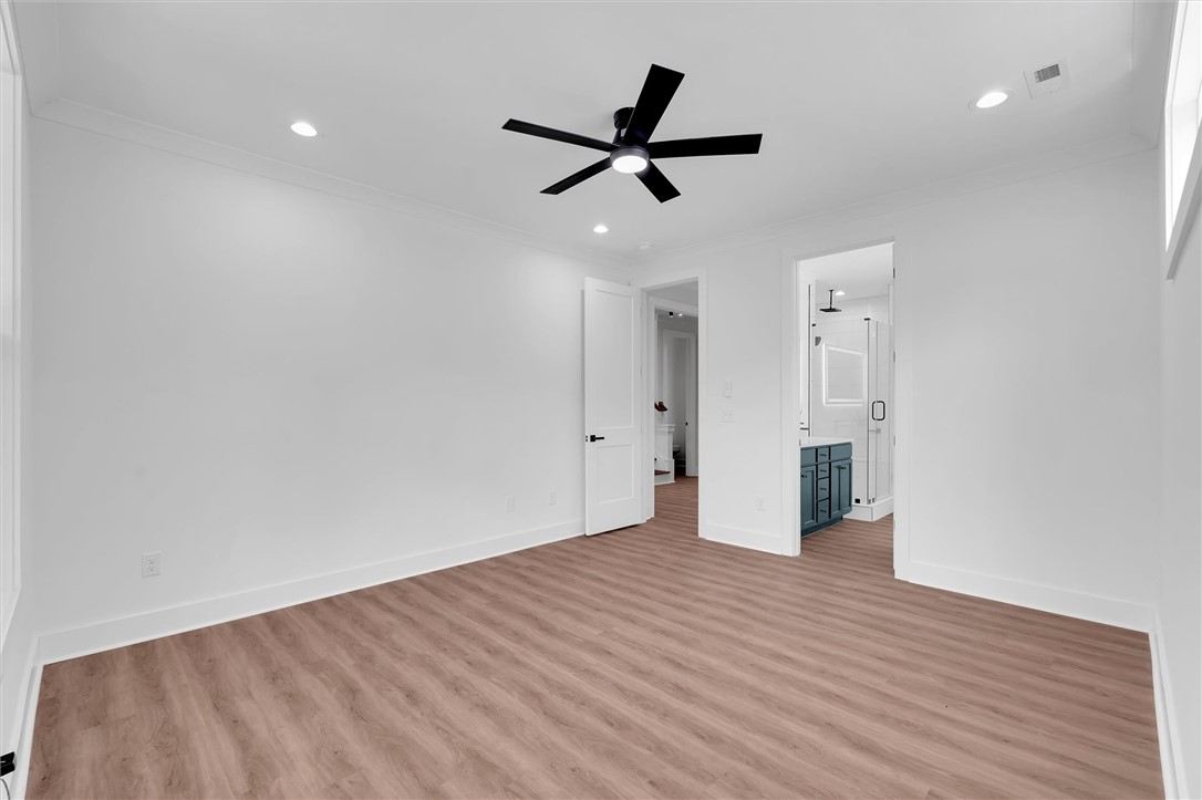 407 Blue Ridge Court Westminster, SC 29693 - Photo 24 of 48 This spacious bedroom offers comfortable living with elegant flooring.