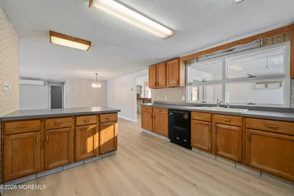 a bathroom with a sink double vanity and a mirror