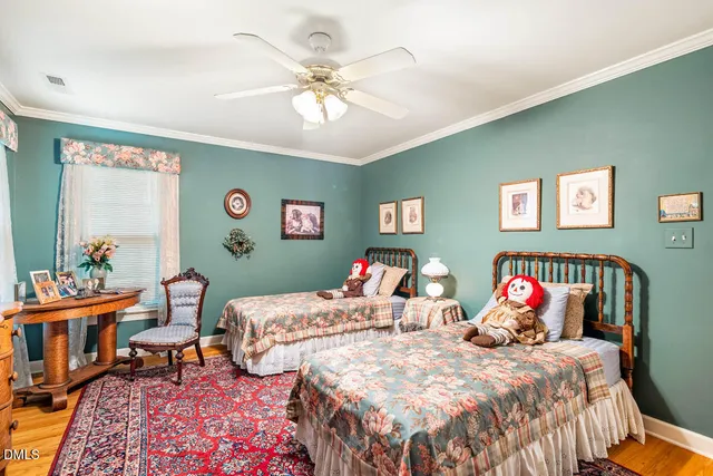 a swimming pool with outdoor seating and yard