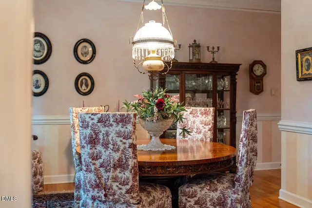 a view of entryway and hall with a mirror