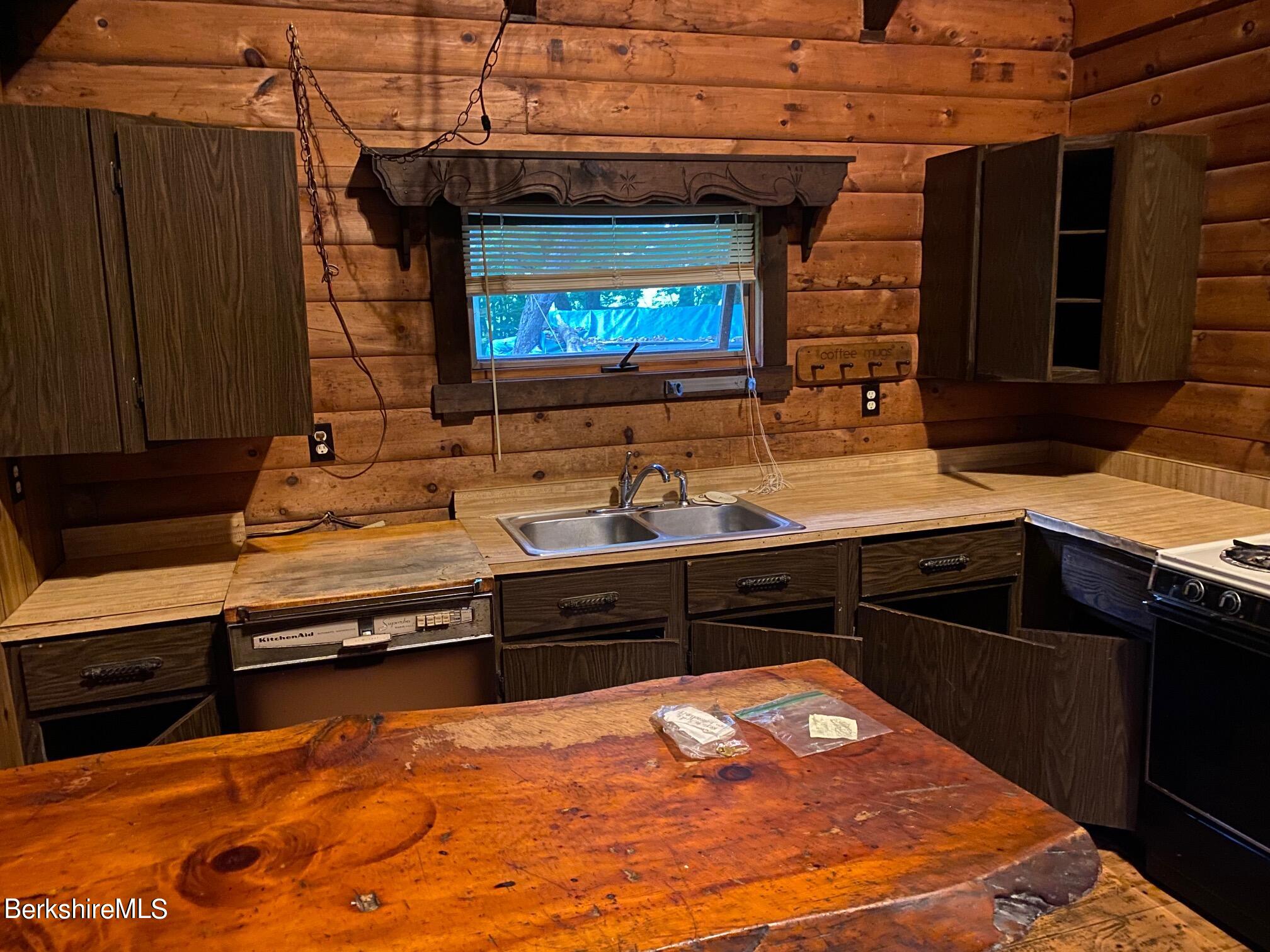 89 East Main Road Peru, MA 01235 - Photo 3 of 4 a kitchen with a sink and a stove top oven