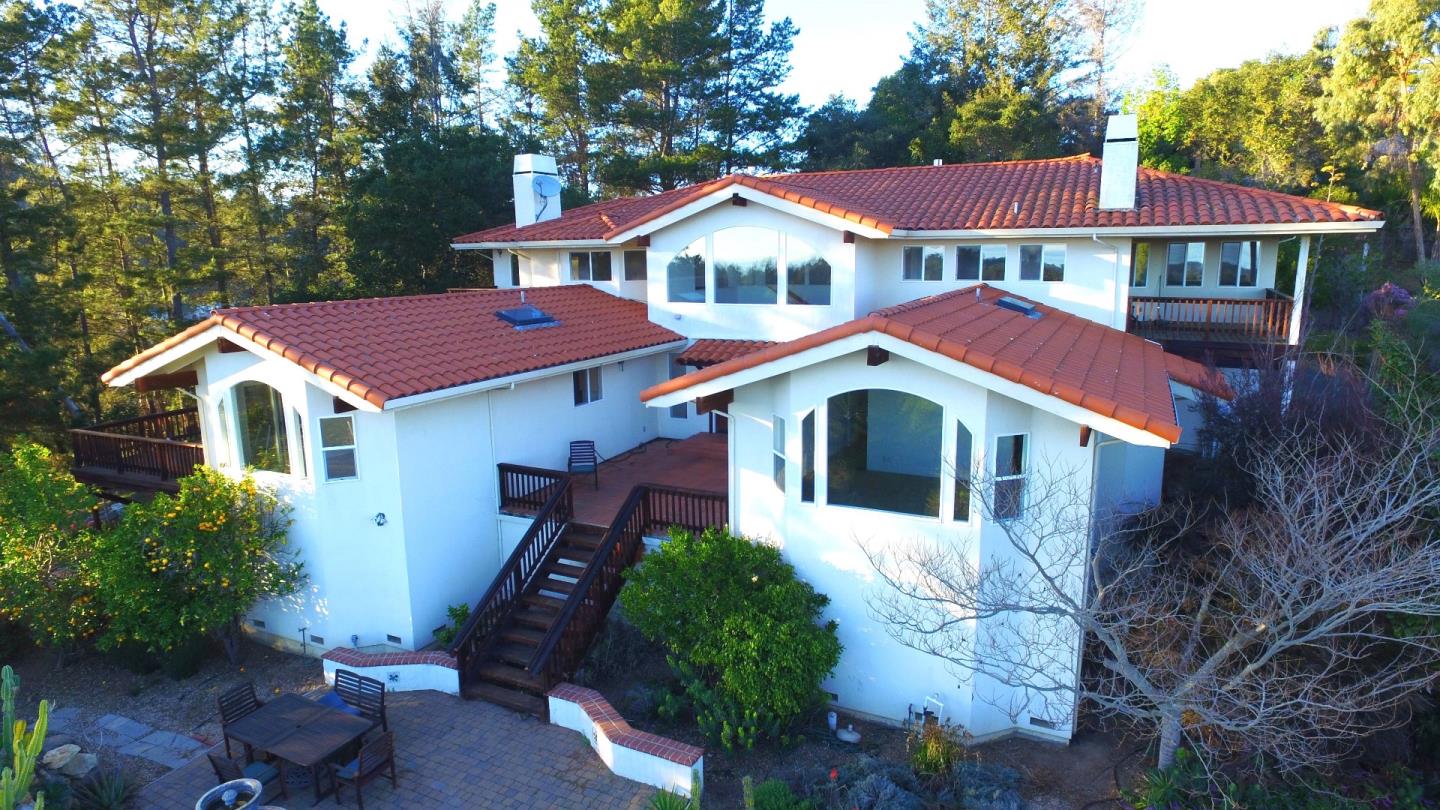 2494 North Rodeo Gulch Road Soquel, CA 95073 - Photo 1 of 34 a front view of a house with yard and green space