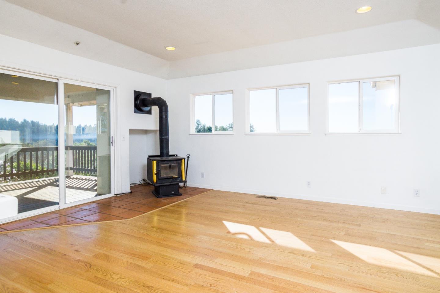 2494 North Rodeo Gulch Road Soquel, CA 95073 - Photo 18 of 34 a view of an empty room with wooden floor and a window