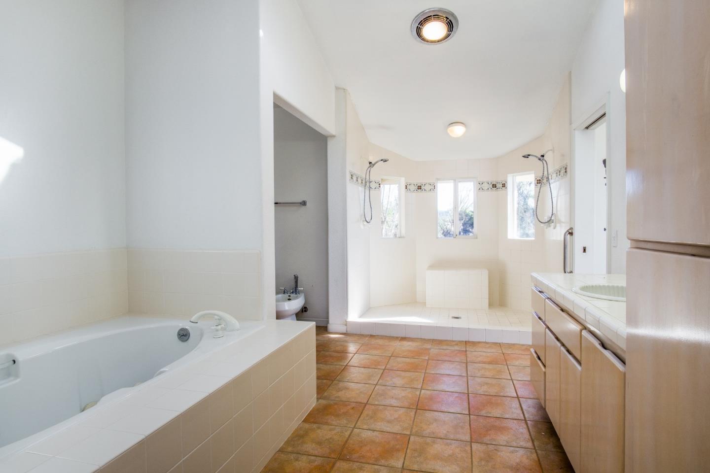 2494 North Rodeo Gulch Road Soquel, CA 95073 - Photo 25 of 34 a bathroom with a bathtub shower and a sink