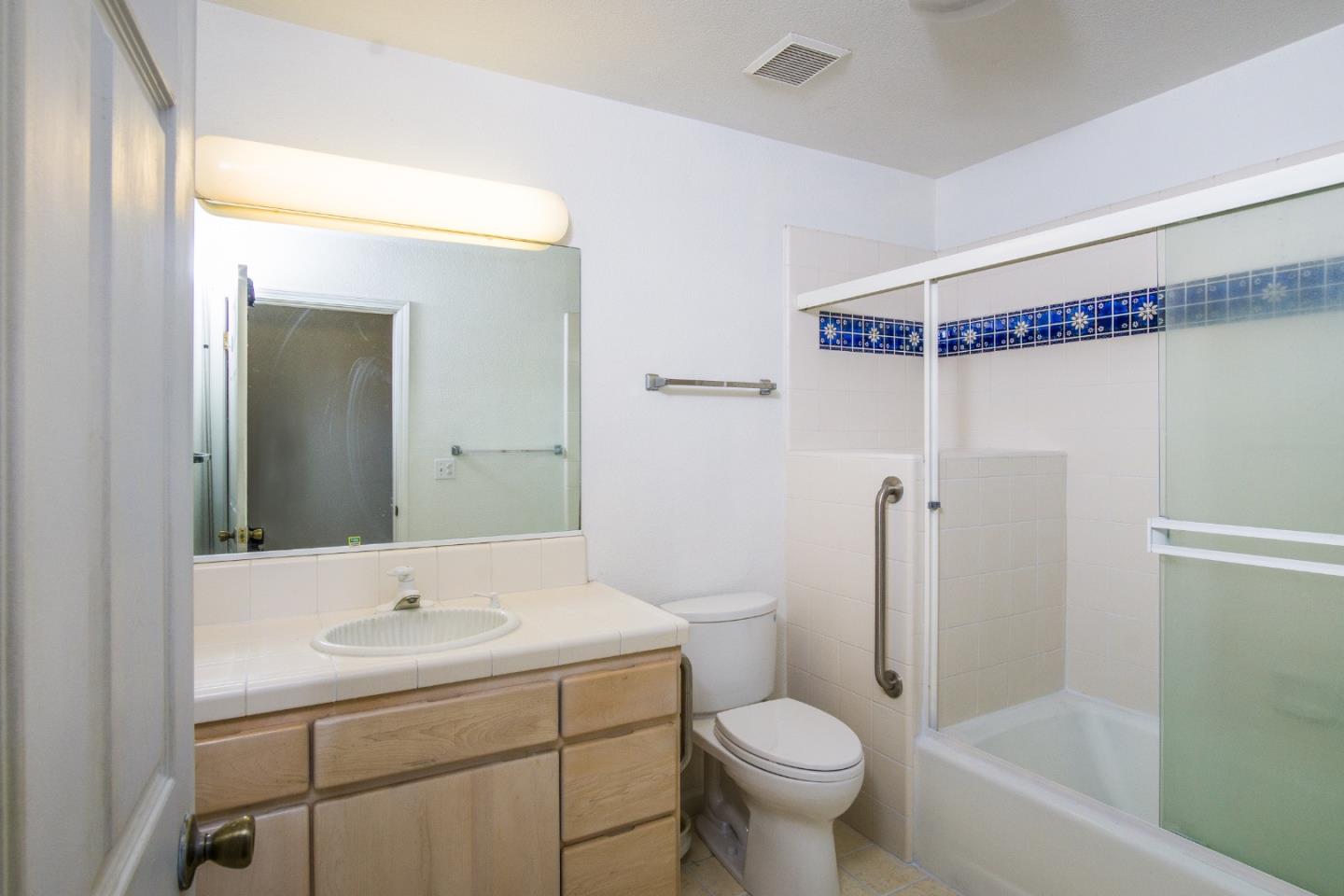 2494 North Rodeo Gulch Road Soquel, CA 95073 - Photo 29 of 34 a bathroom with a sink toilet and shower