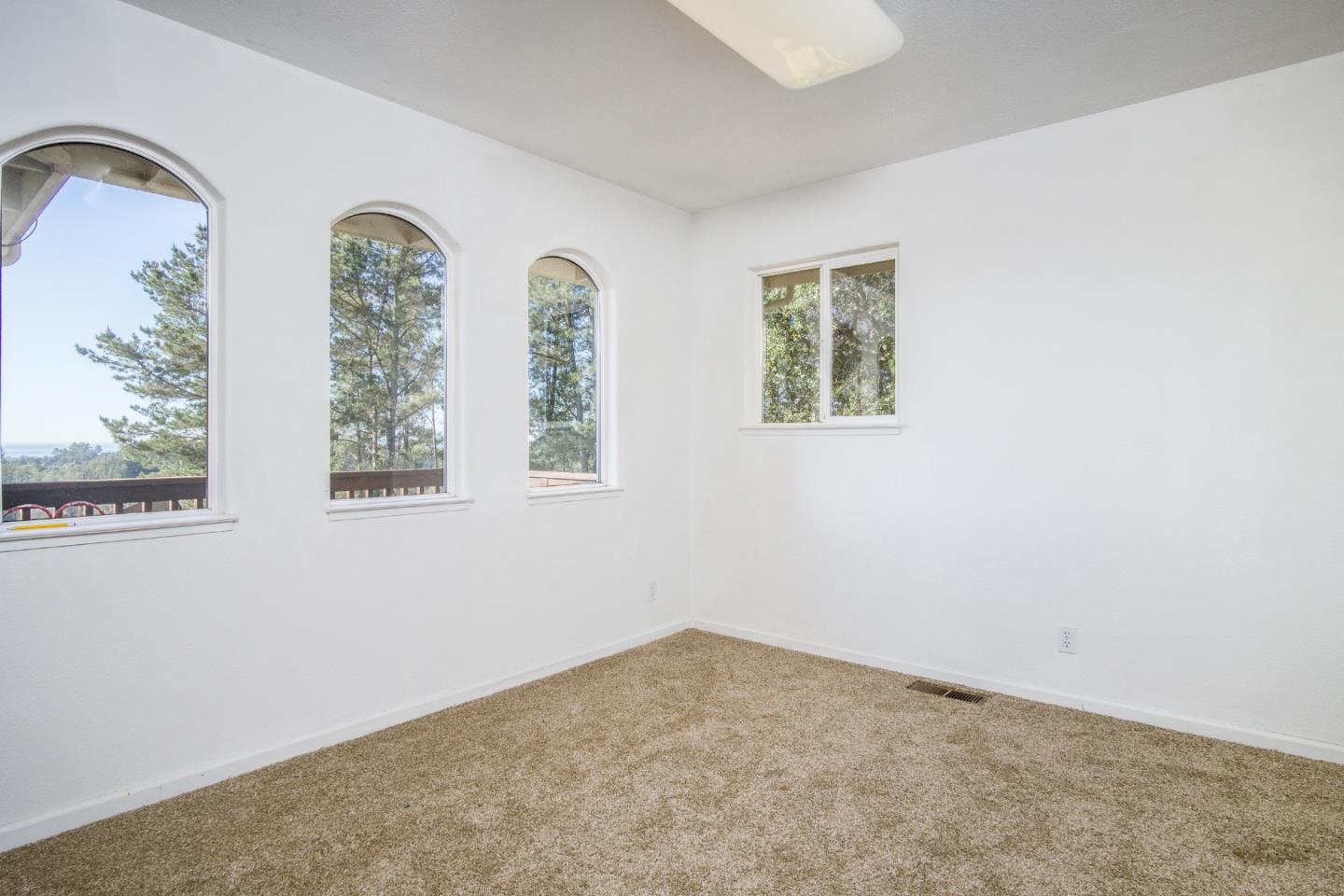 2494 North Rodeo Gulch Road Soquel, CA 95073 - Photo 30 of 34 an empty room with windows