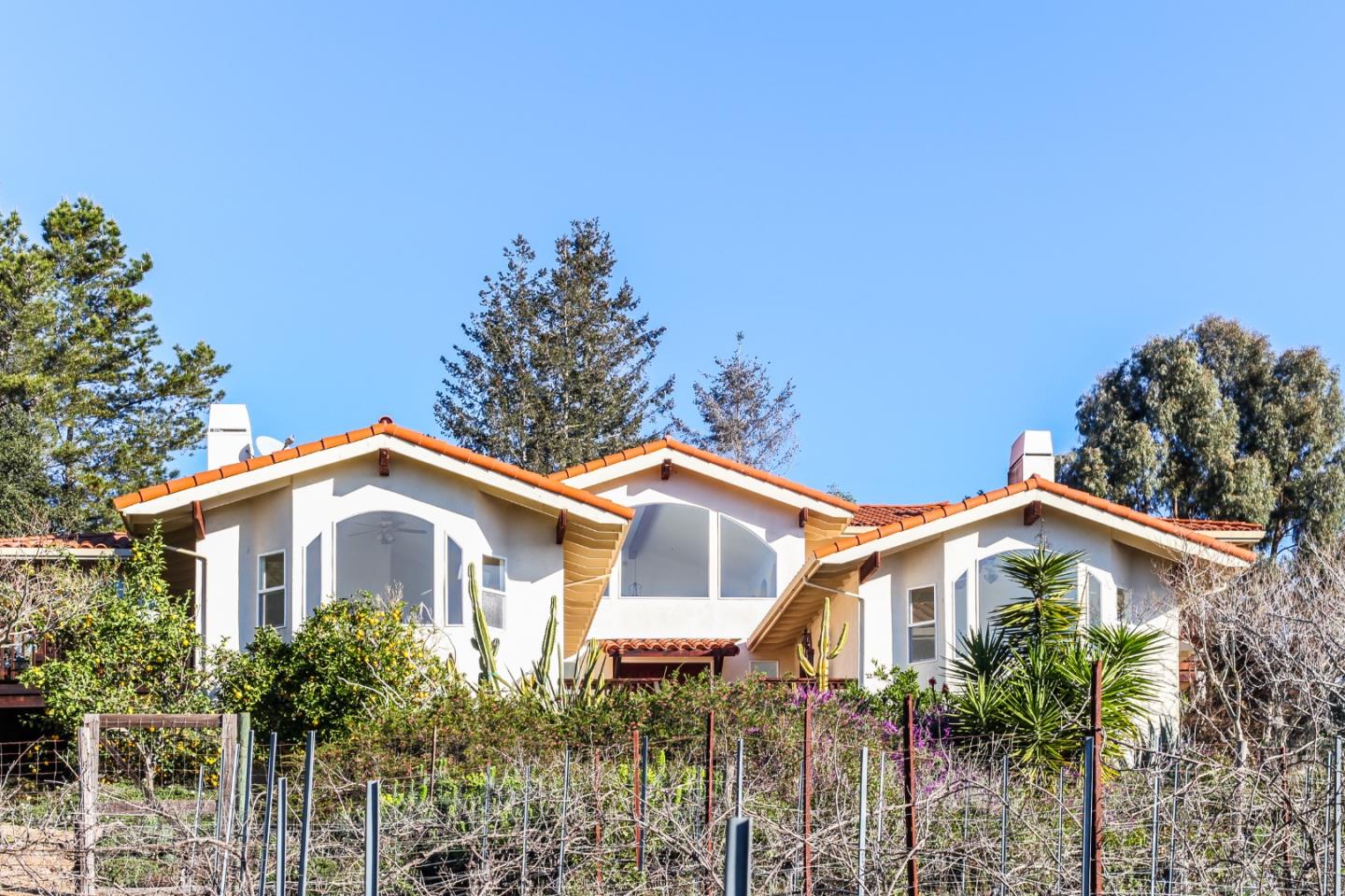 2494 North Rodeo Gulch Road Soquel, CA 95073 - Photo 34 of 34 a front view of a house with a yard and potted plants