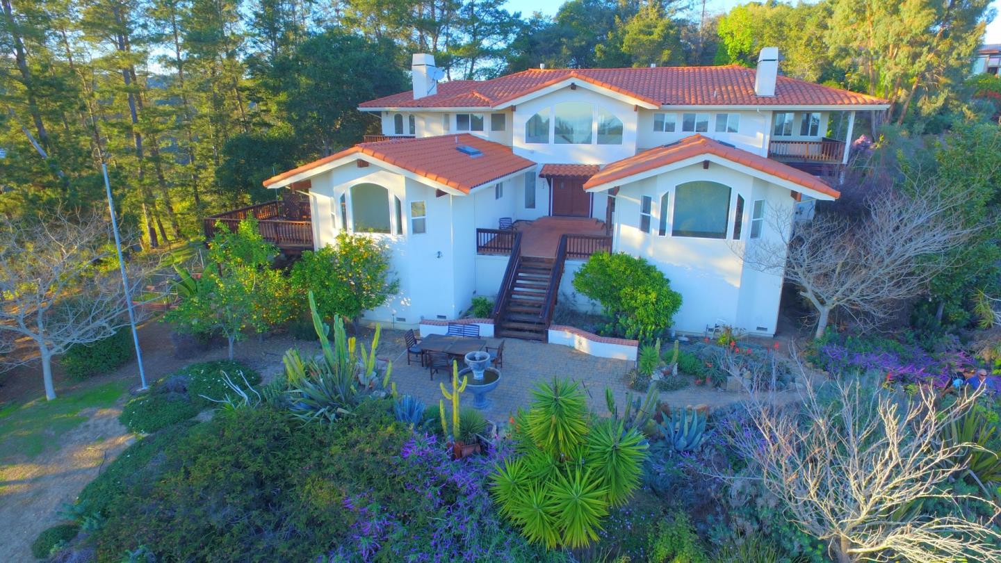 2494 North Rodeo Gulch Road Soquel, CA 95073 - Photo 6 of 34 a front view of a house with garden