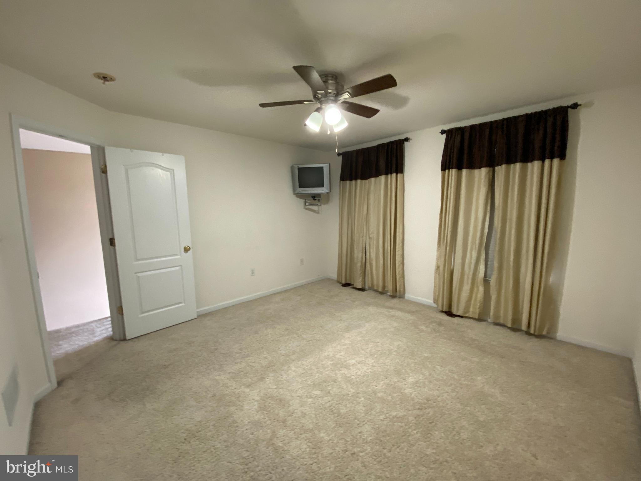 145 Long View Carlisle, PA 17013 - Photo 16 of 27 an empty room with closet and a ceiling fan