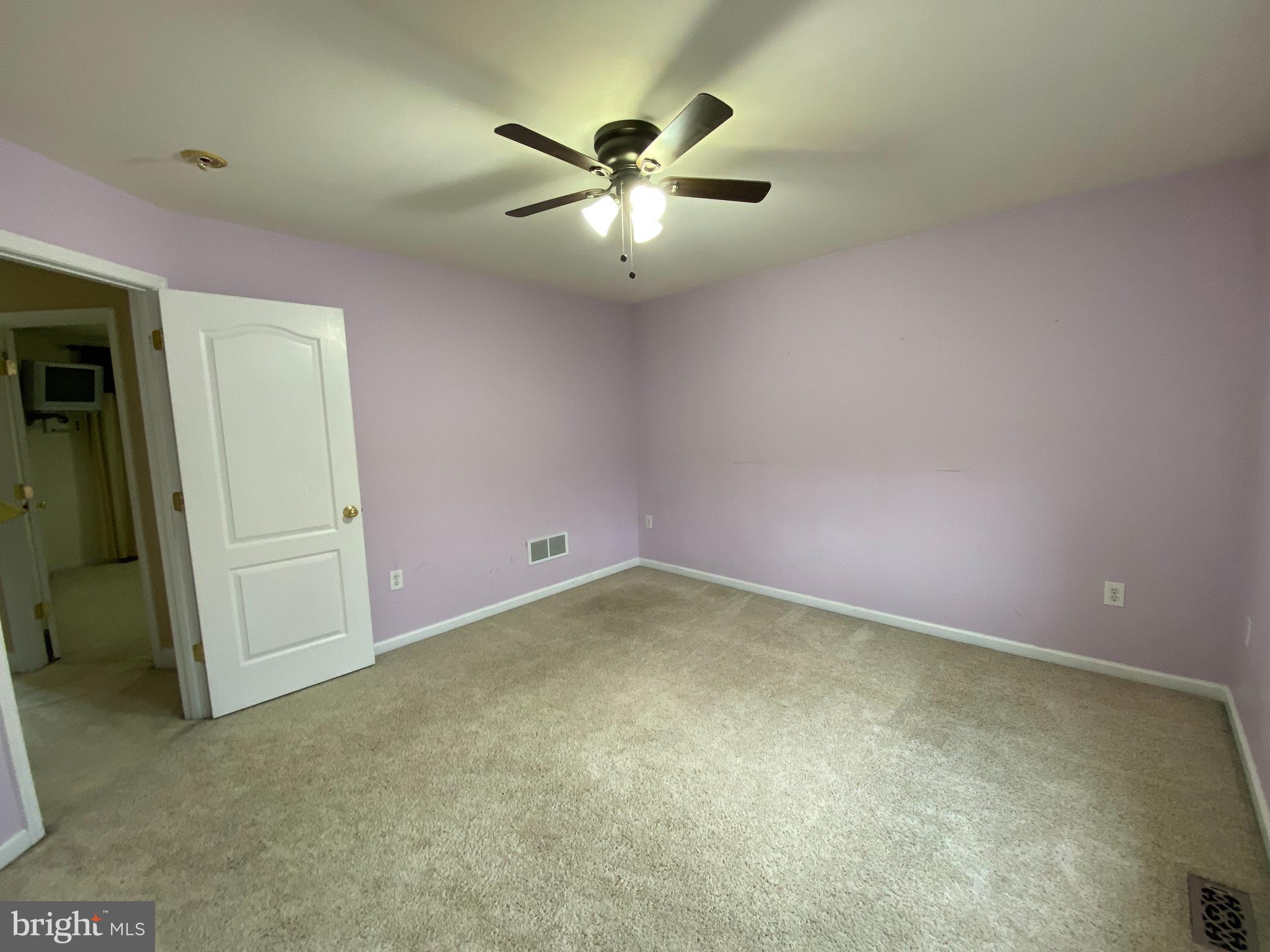 145 Long View Carlisle, PA 17013 - Photo 17 of 27 an empty room with ceiling fan and window