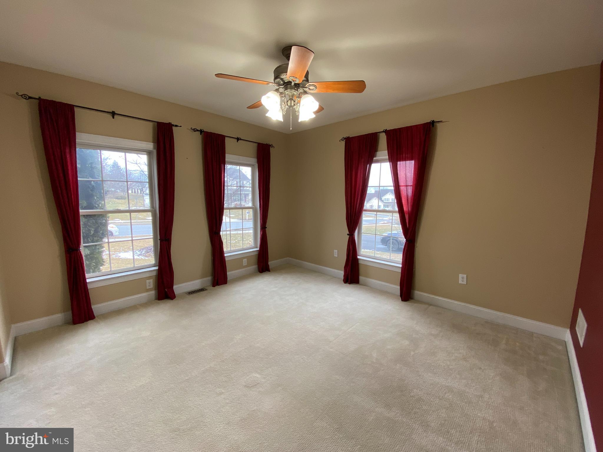 145 Long View Carlisle, PA 17013 - Photo 4 of 27 a view of an empty room with window and stairs