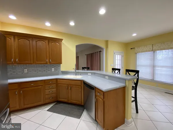 a kitchen with cabinets and sink