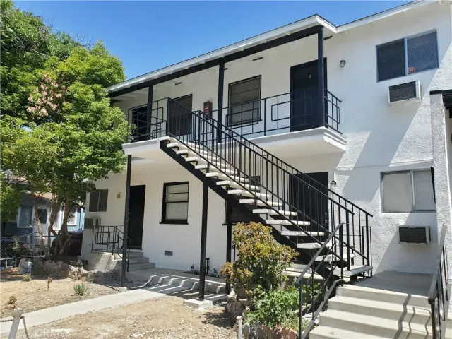 a house view with a outdoor space