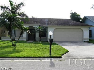 13227 Heather Ridge Loop Fort Myers, FL 33966 - Photo 1 of 10 front view of a house with a yard