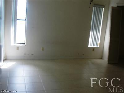 13227 Heather Ridge Loop Fort Myers, FL 33966 - Photo 8 of 10 a view of an empty room and window