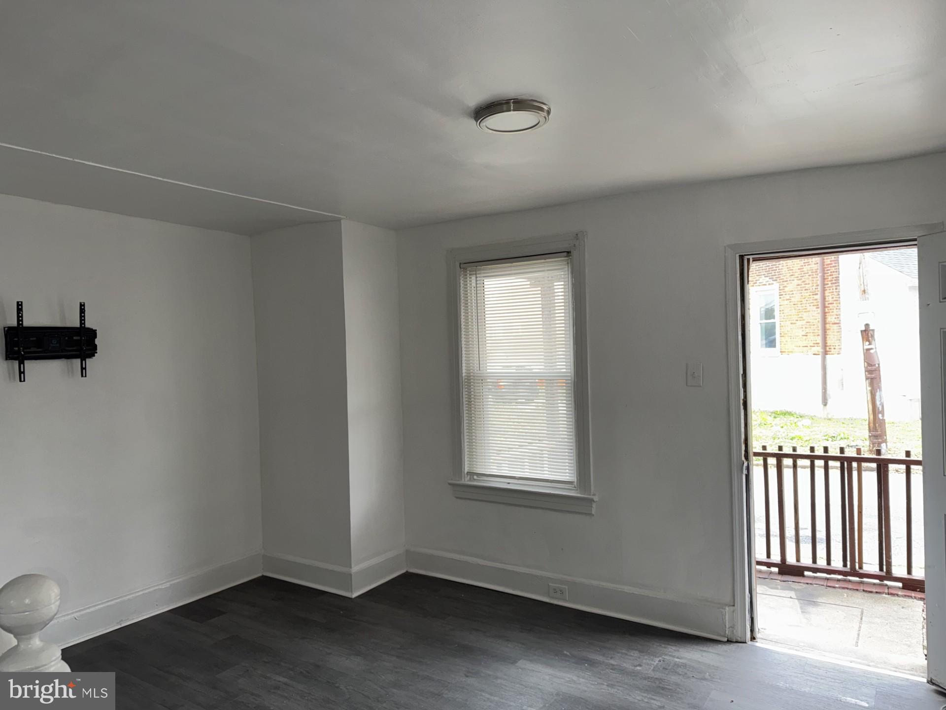 536 Keystone Avenue Darby, PA 19023 - Photo 4 of 11 a view of an empty room with a window