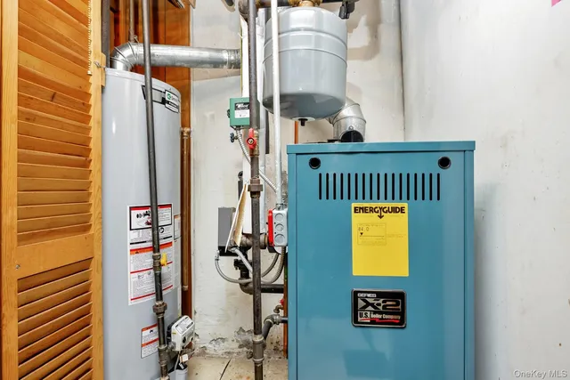 a view of a yard with wooden fence