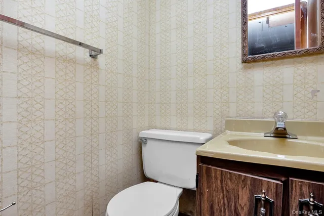 a house view with a sitting space and a garden