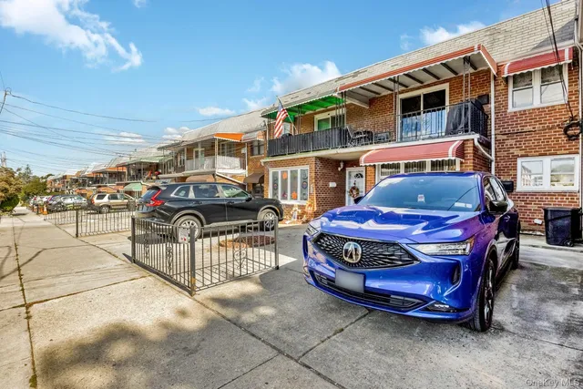 a front view of a house with a garage