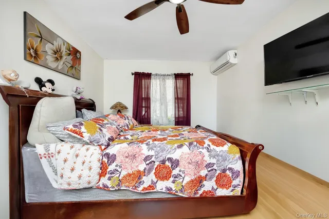 a bathroom with a sink toilet and mirror