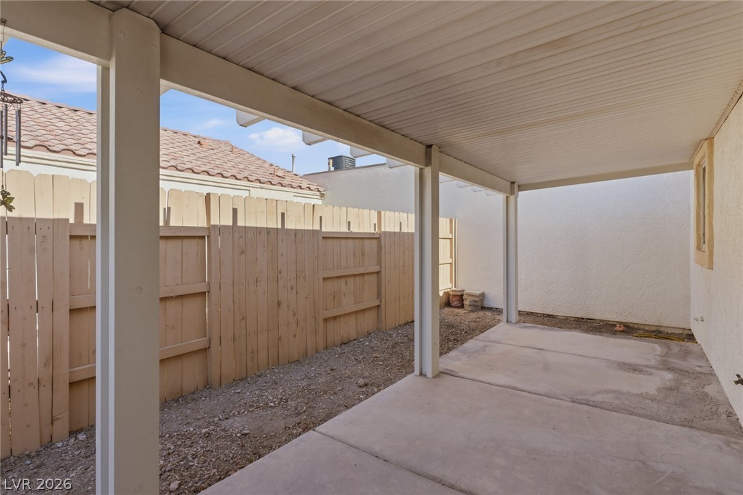 5449 Bugle Way, Unit 104 Las Vegas, NV 89108 - Photo 15 of 33 patio 1- This outdoor area offers a private patio, perfect for enjoying peaceful moments outdoors.