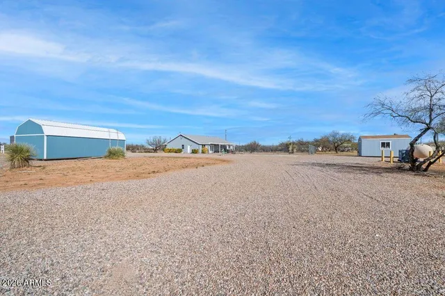 a view of ocean and a houses