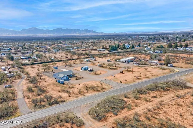 an aerial view of beach and city