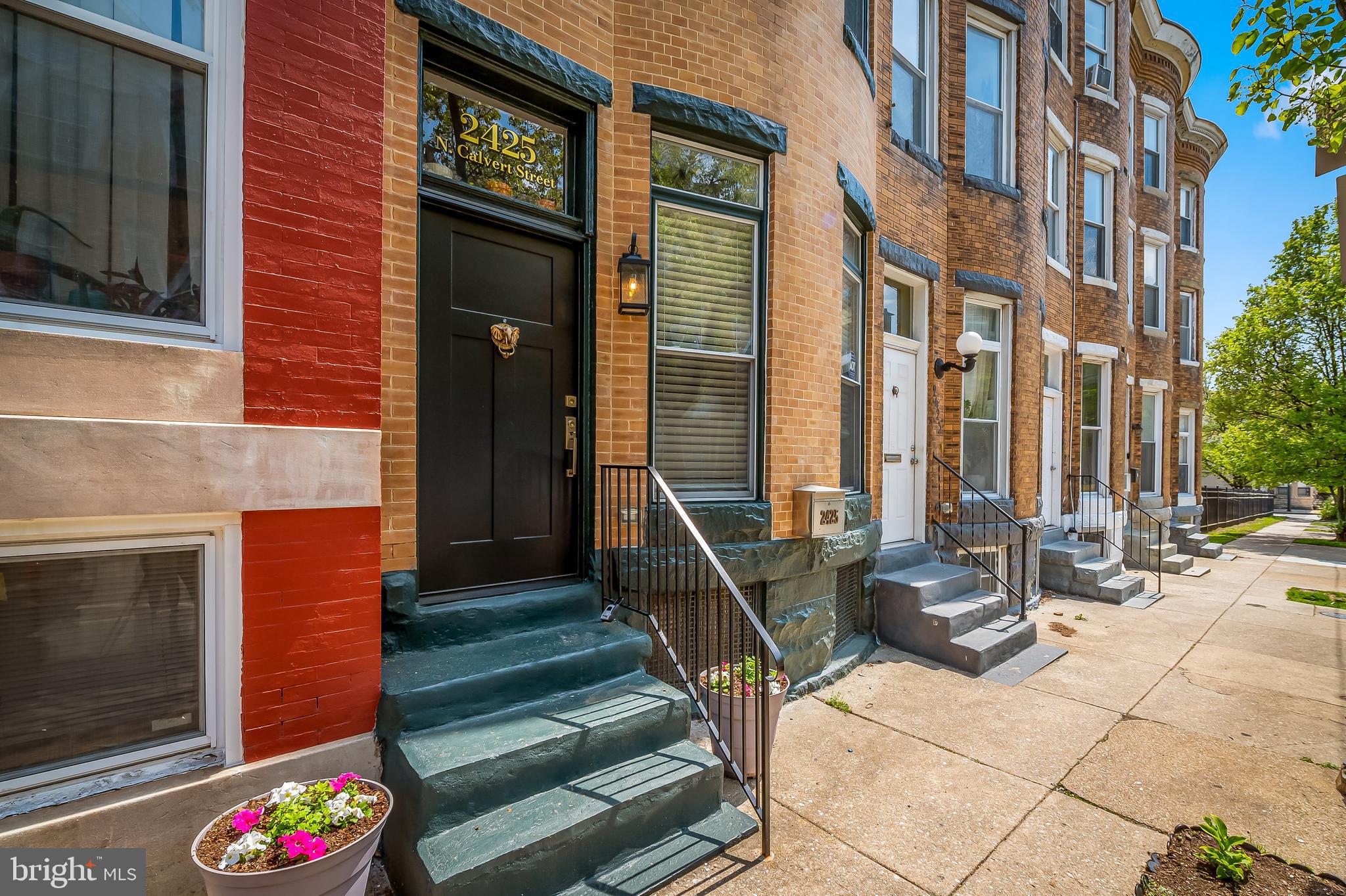 2425 North Calvert Street Baltimore, MD 21218 - Photo 1 of 44 a building outdoor space with seating space