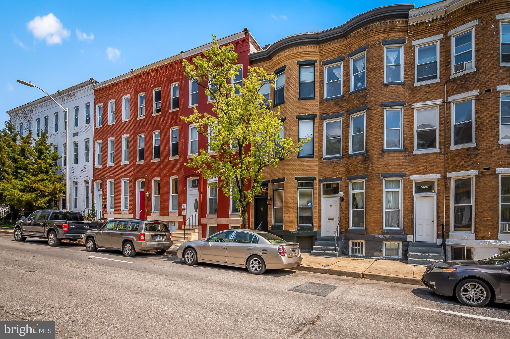 2425 North Calvert Street Baltimore, MD 21218 - Photo 3 of 44 a car parked in front of a building