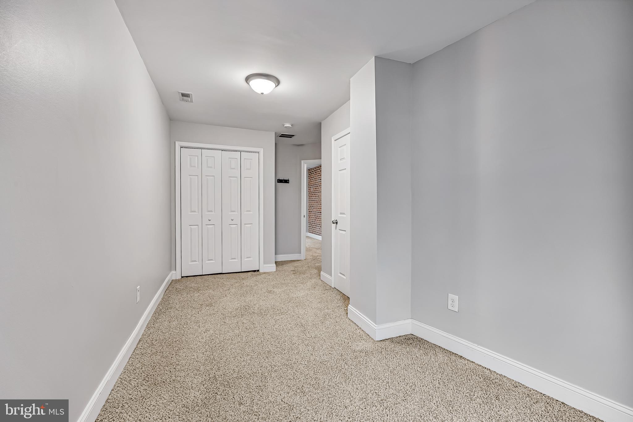 2425 North Calvert Street Baltimore, MD 21218 - Photo 34 of 44 a view of an empty room