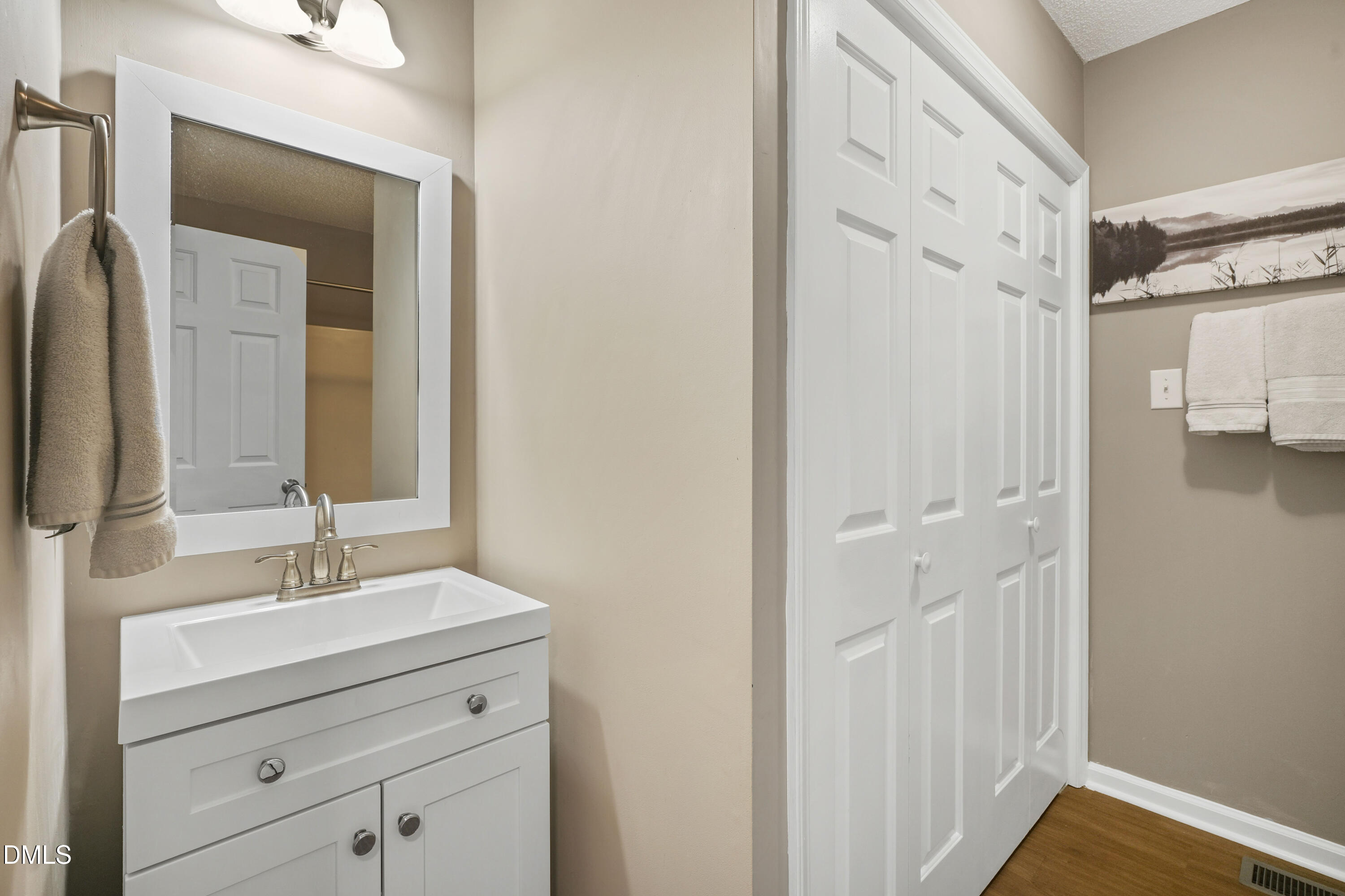 101 Stephenson Road Benson, NC 27504 - Photo 20 of 29 a bathroom with a sink vanity and a mirror