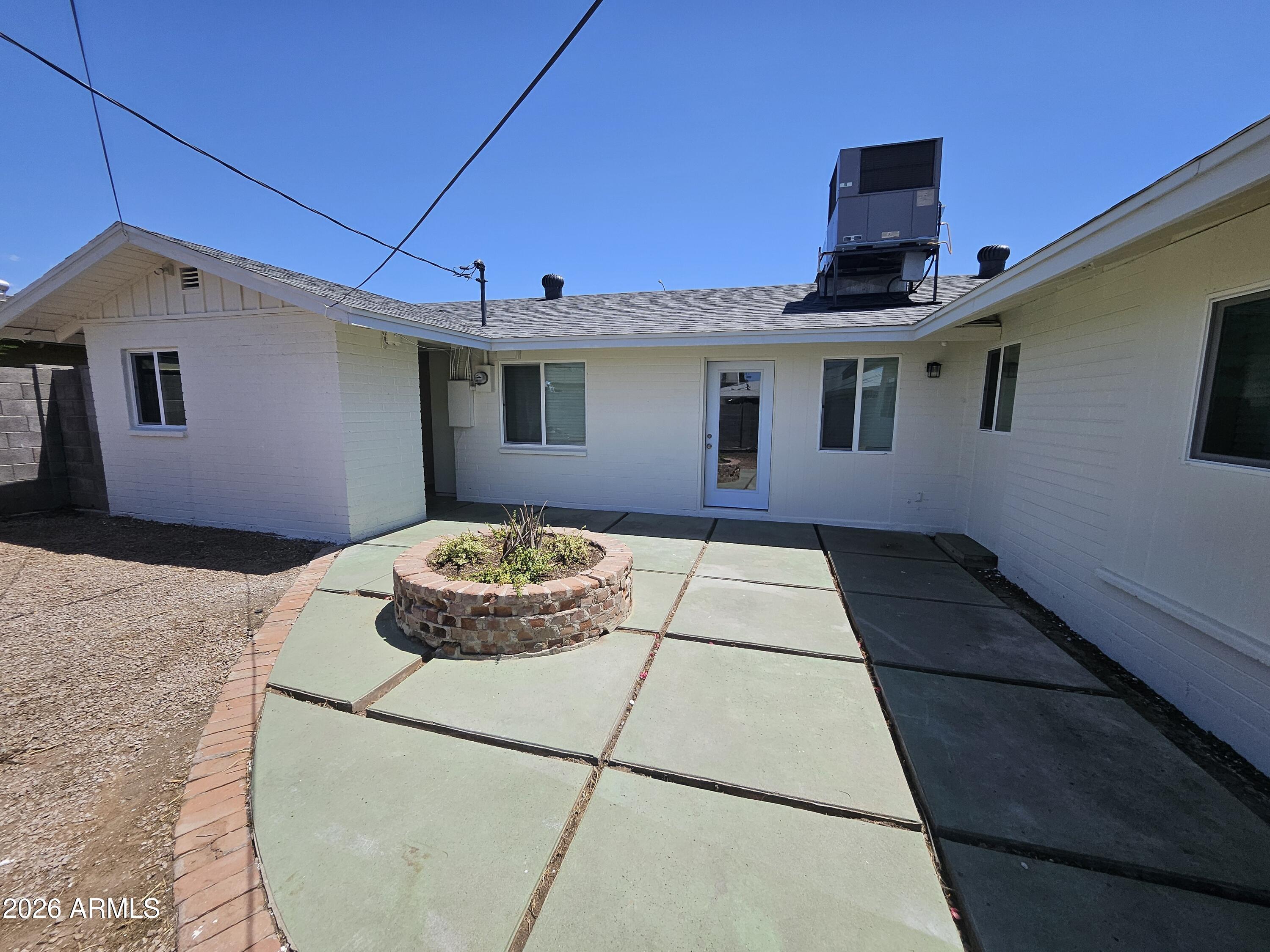 524 West 3rd Place Mesa, AZ 85201 - Photo 19 of 23 a front view of a house with a yard