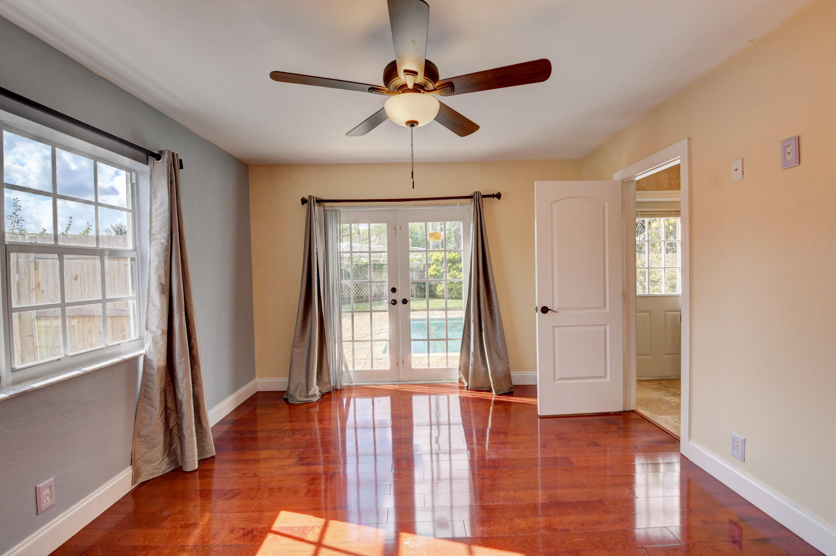 1100 West Camino Real Boca Raton, FL 33486 - Photo 14 of 35 Owners Suite leads to pool area
