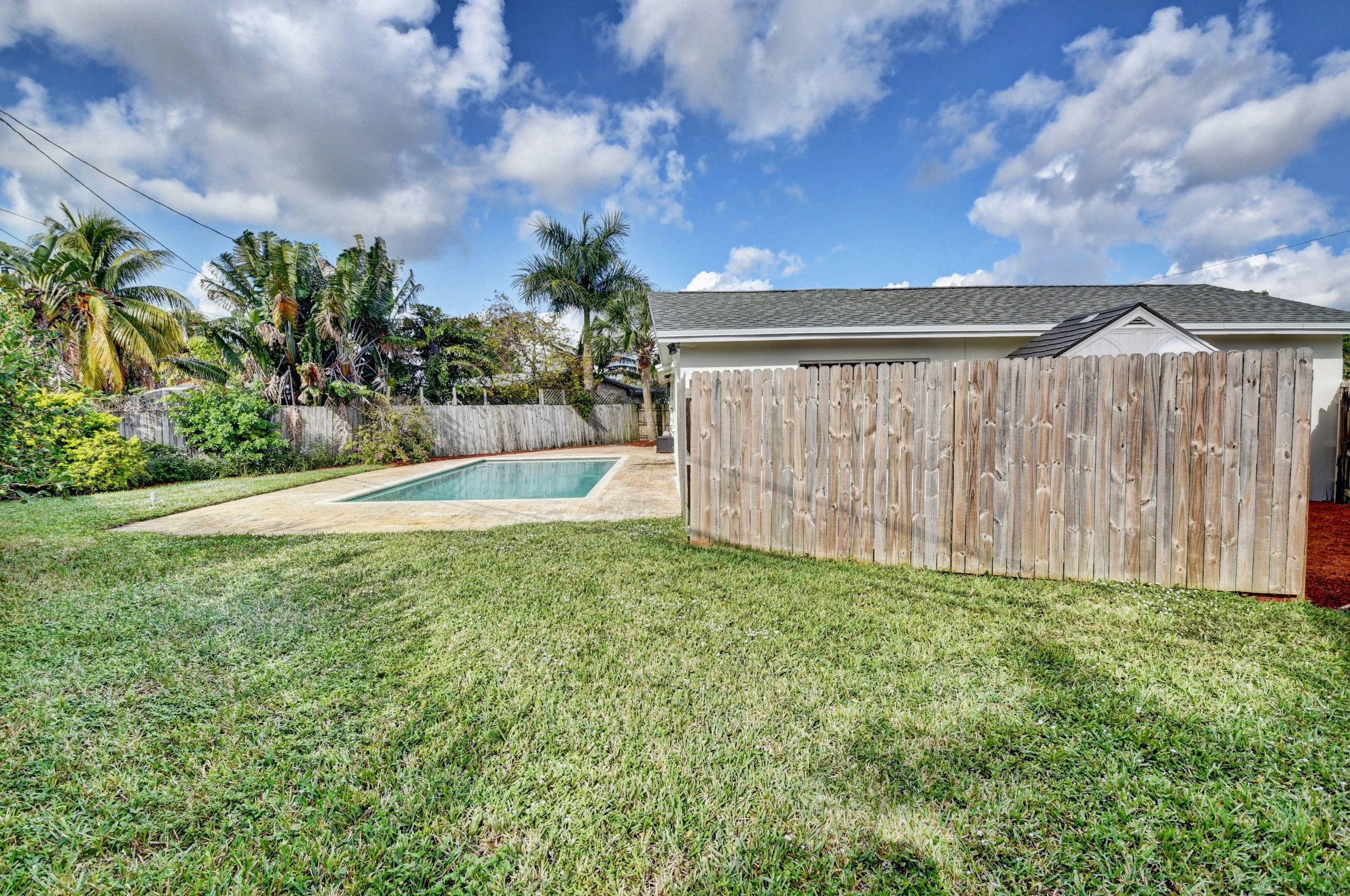1100 West Camino Real Boca Raton, FL 33486 - Photo 20 of 35 Fence conceals shed