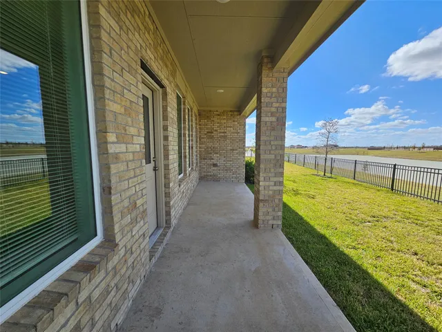 a view of a balcony with ocean view