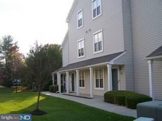 504 B Wharton Road, Unit B Mount Laurel, NJ 08054 - Photo 1 of 6 a view of a house with a yard