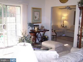 504 B Wharton Road, Unit B Mount Laurel, NJ 08054 - Photo 5 of 6 a view of a livingroom with furniture and a window