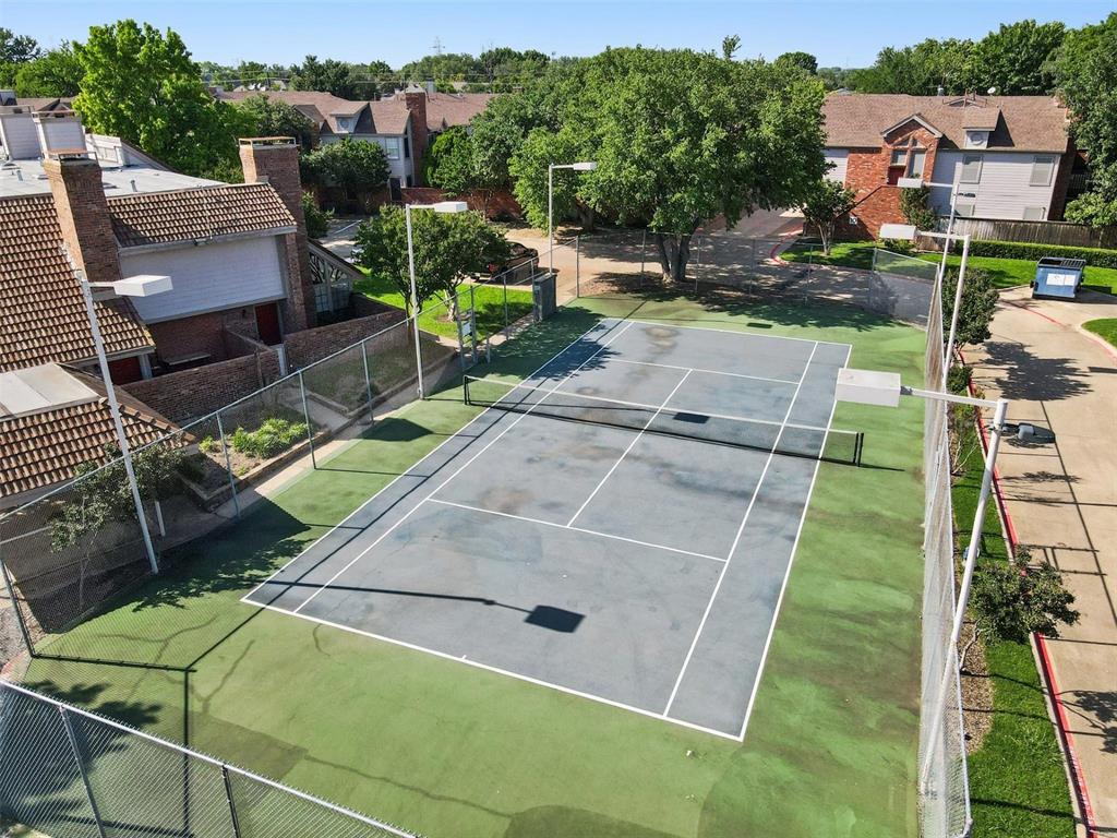 18240 Midway Road, Unit 1204 Dallas, TX 75287 - Photo 4 of 27 an aerial view of a house with a yard